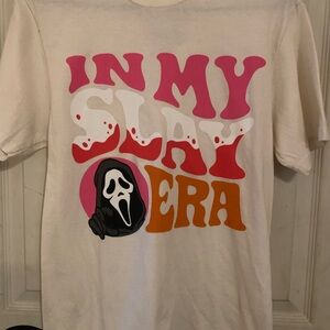 Graphic Tee with Bold Text and Scream Design